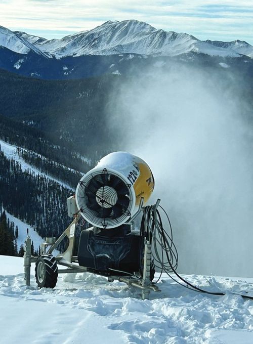 A Keystone mobile fan gun blows snow on a November morning.