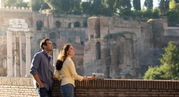 Tourists at the Roman ruins in Rome.