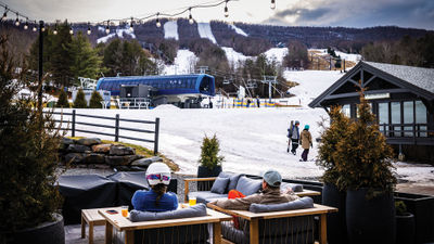 Visitors at The Terrace, Windham Mountain Club's slopeside full-service, outdoor lounge.