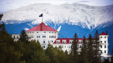 The snow-covered peaks of the White Mountains provide the backdrop for the 269-room resort.