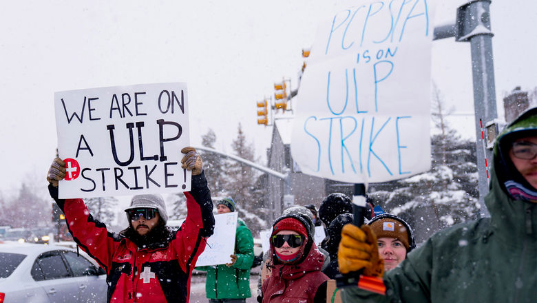 Park City Mountain ski patrollers picketing. A strike has sharply limited the amount of ski terrain that is open.