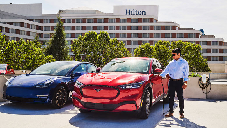 A charging station for electric vehicles at a Hilton hotel.