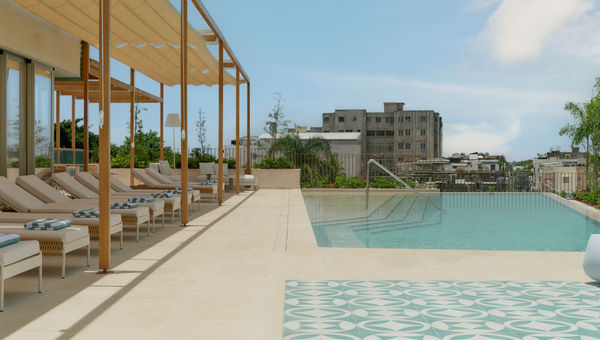 The Kimpton Las Mercedes has a rooftop pool and gym with views overlooking Santo Domingo.