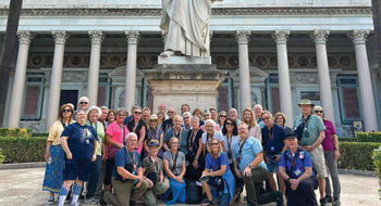 An ETS Tours group at the Basilica of Saint Paul Outside the Walls in Rome. ETS Tours, which offers faith-based itineraries, has planned special trips for the Holy Year.