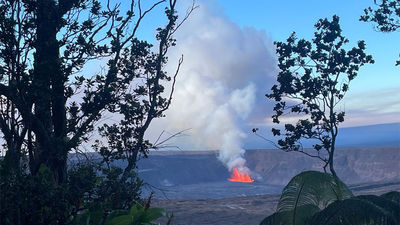 Lava fountains erupt at Kilauea Volcano, as seen from the Kupinai Pali lookout at Hawaii Volcanoes National Park.