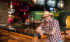 The centerpiece of the Tractor Bar is a vintage John Deere Tractor, a nod to Jason Aldean's hit song, "Big Green Tractor."