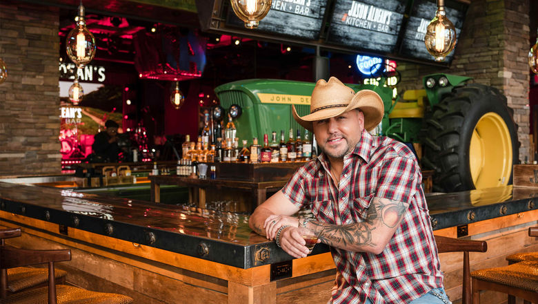 The centerpiece of the Tractor Bar is a vintage John Deere Tractor, a nod to Jason Aldean's hit song, "Big Green Tractor."